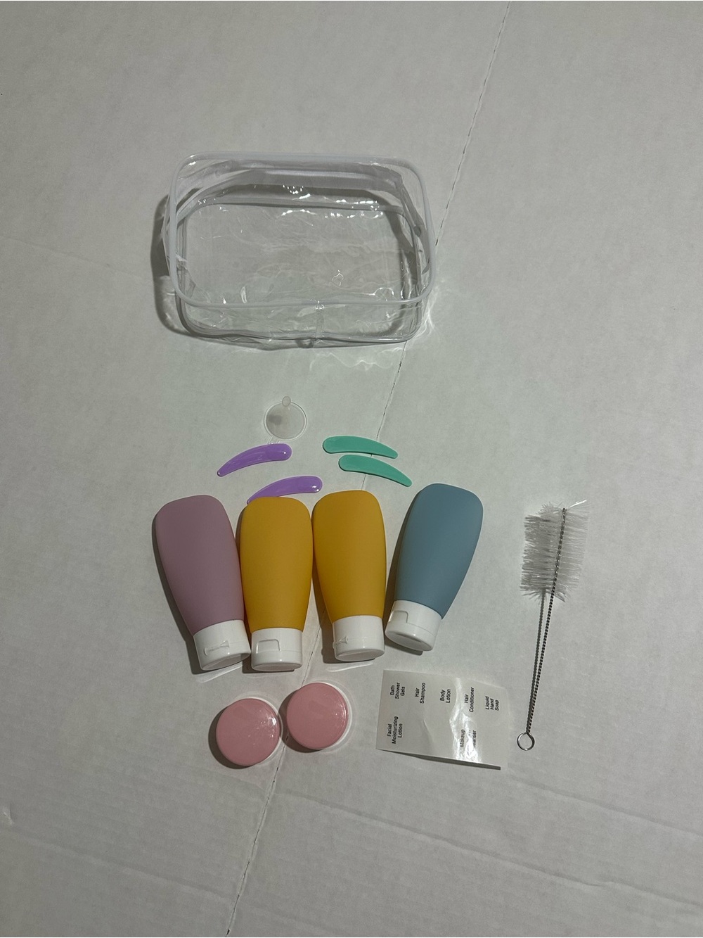 Brand new Silicone Travel Bottle Set – Pink, Yellow, Blue – Unbranded